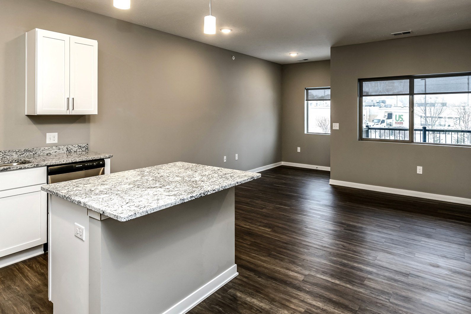 Open concept floor plans White cabinet countertops at LIV 156 Apartments in Omaha, NE